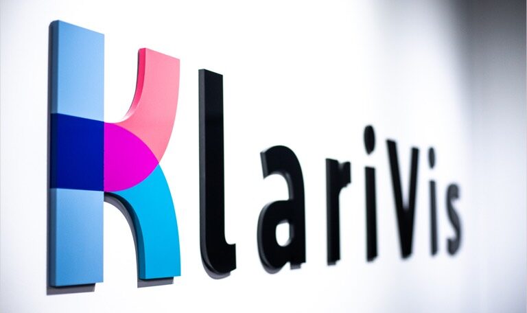 klarivis logo on board room wall